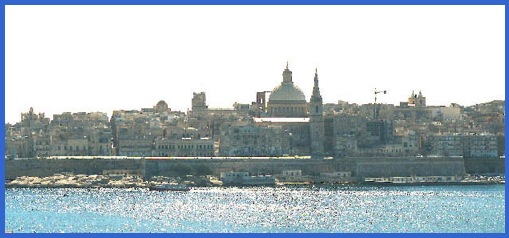 Valletta, with the sun making the sea sparkle.<br />